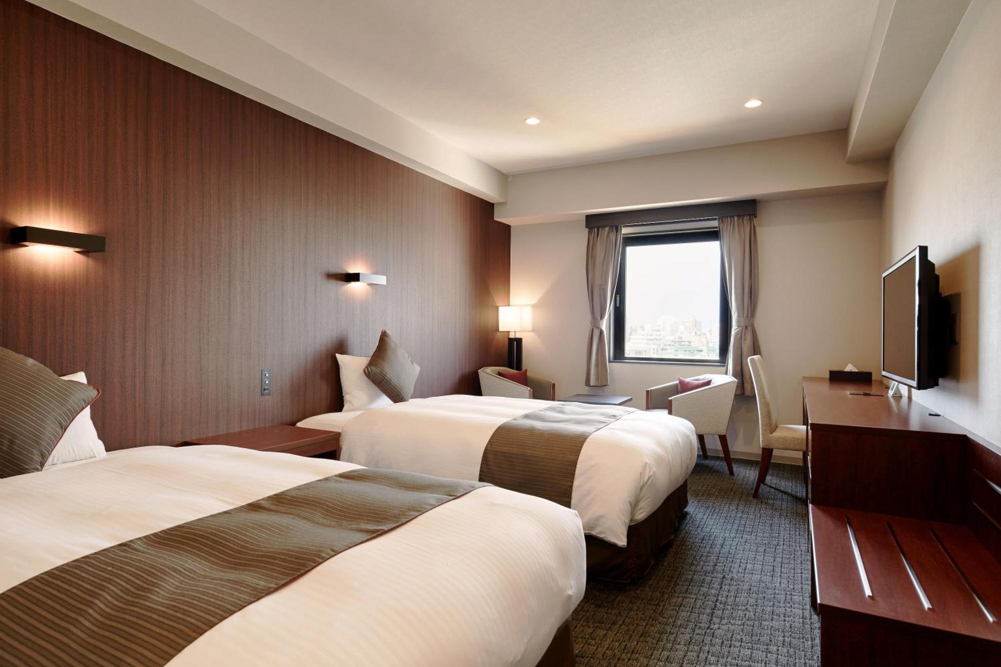 Hotel Azat Naha Esterno foto